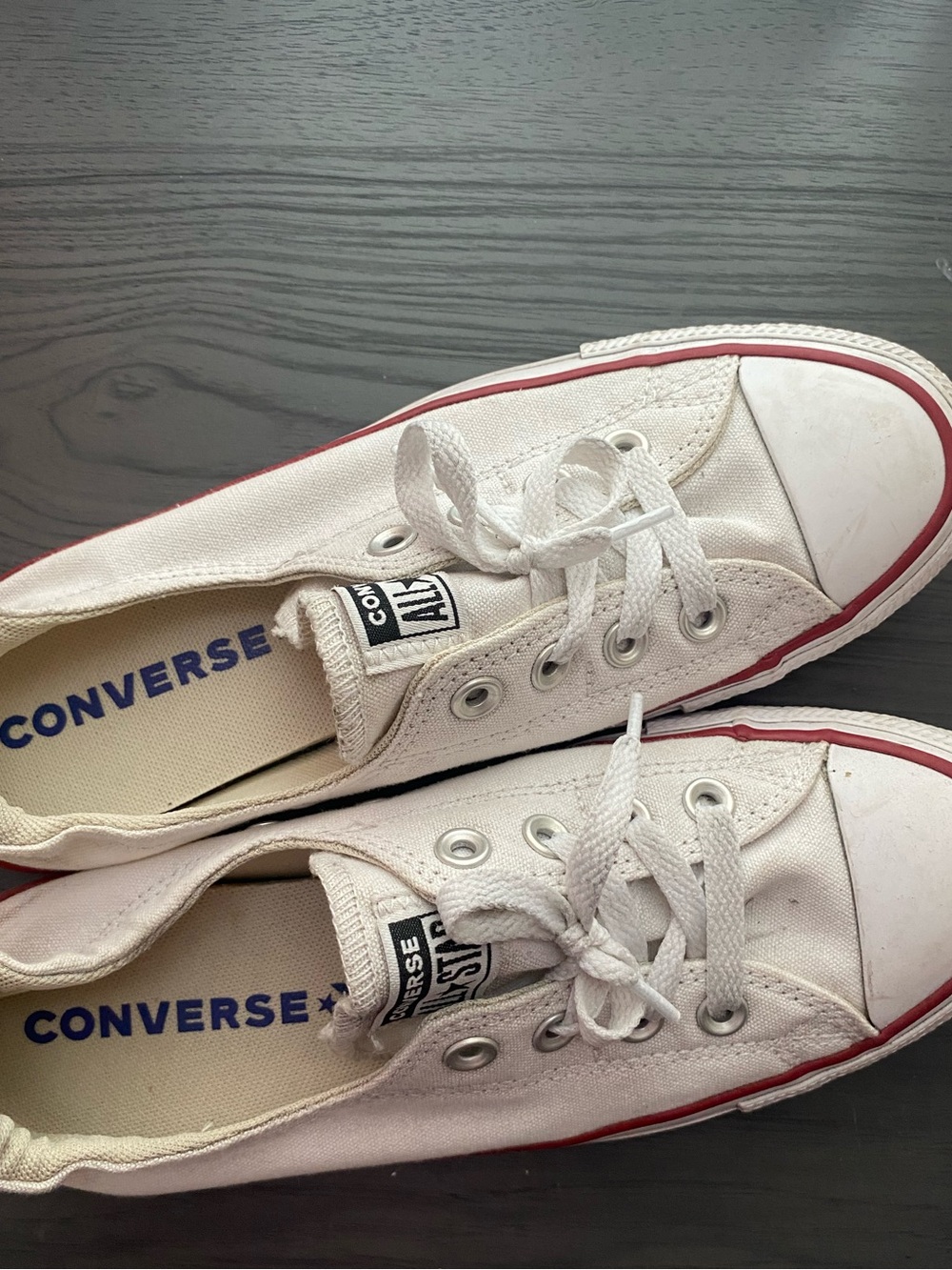 Converse Low Top Canvas Shoes in Cream with Red and Black Trim